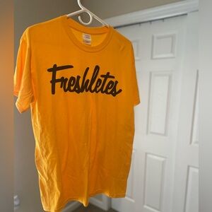 Freshletes yellow and black shirt.  Size Medium. Mike Stud Brand